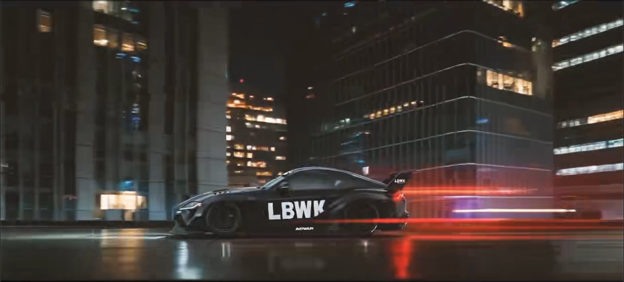 Side tracking shot with red light trails in a city